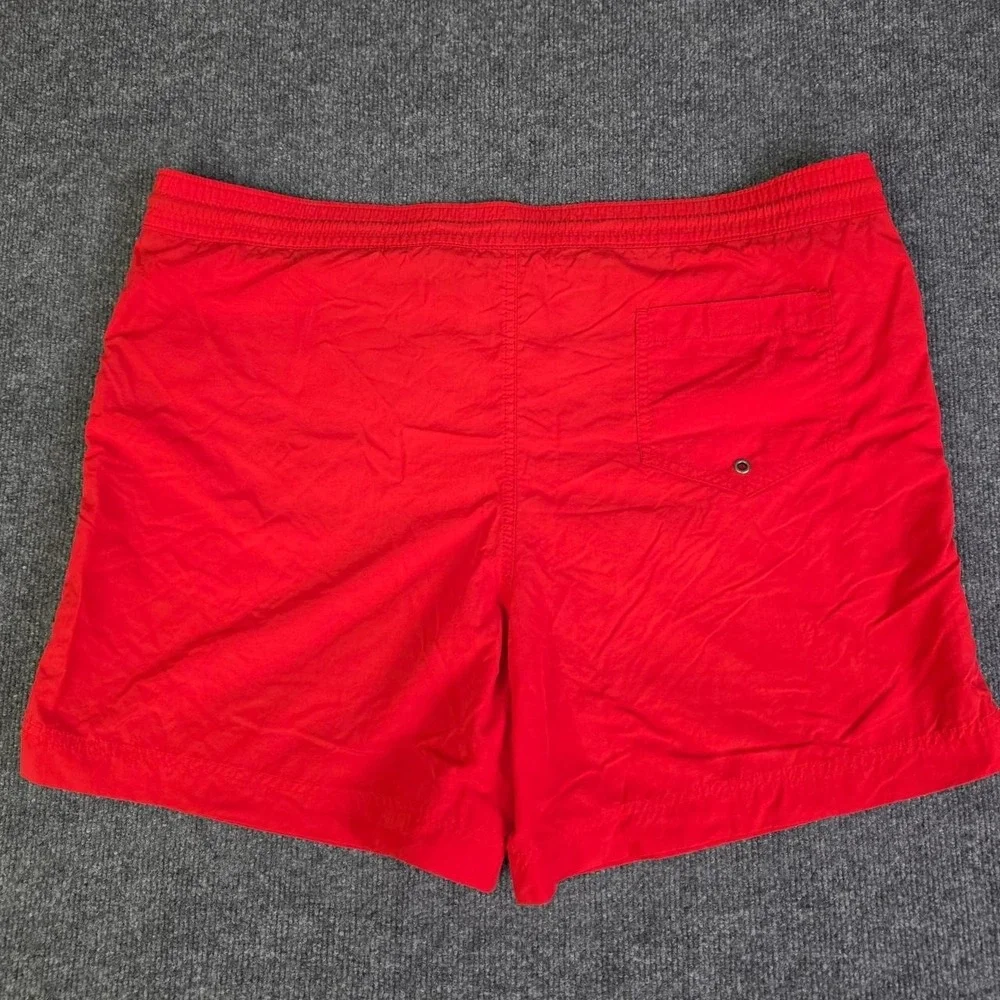 Polo Ralph Lauren orange swim shorts with blue drawstrings. Size XL.